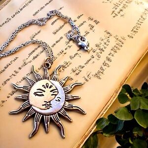 Silver and bronze toned Sun and Moon Pendant Necklace